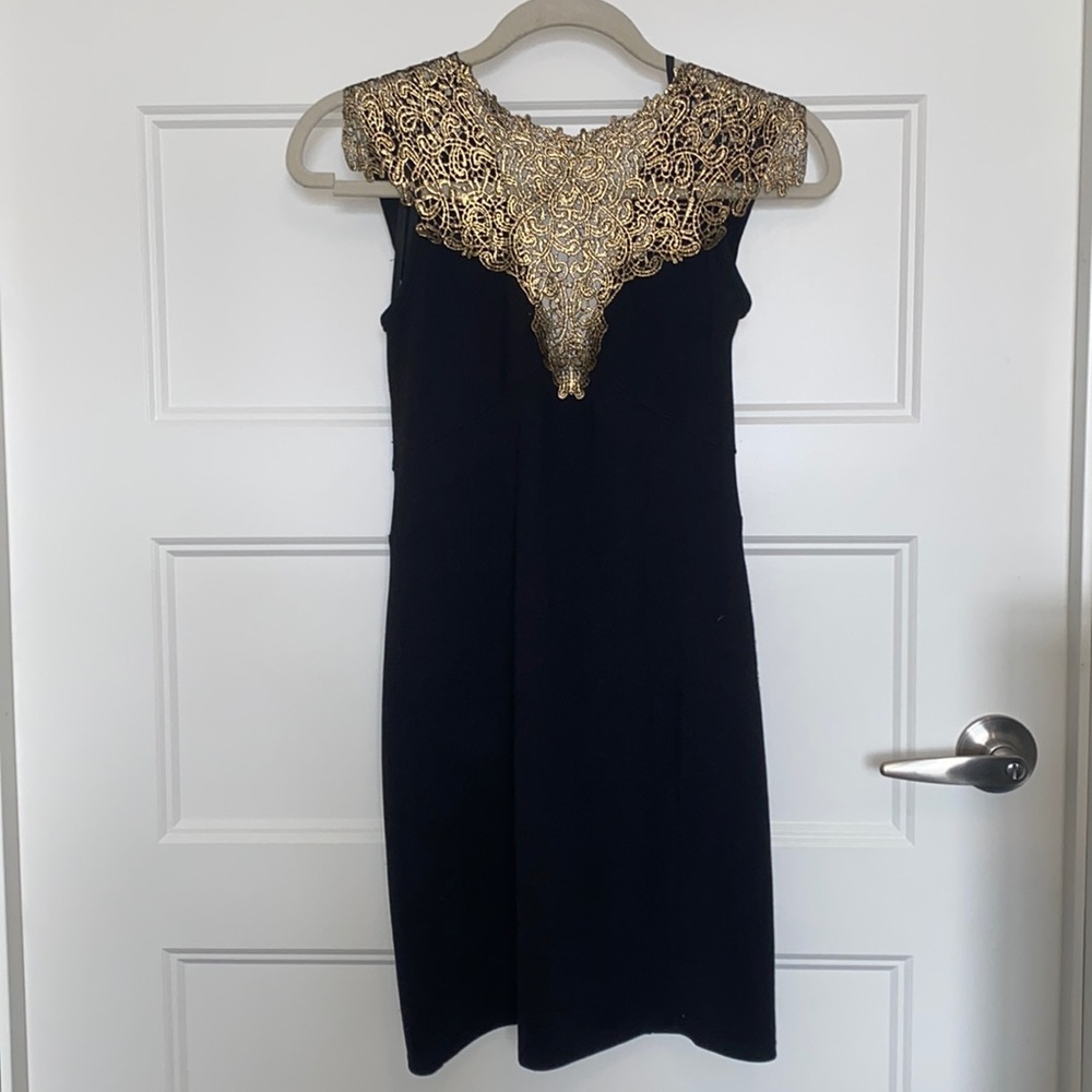 Fun cocktail dress with gold neckline